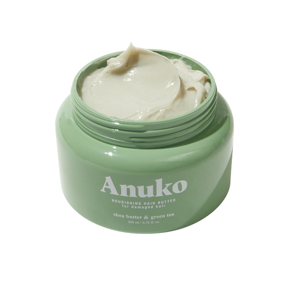 Anuko Nourishing Hair Butter, open sage-green jar of whipped cream
