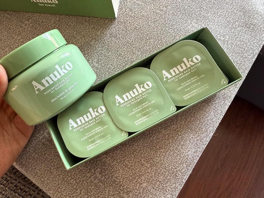A verified Anuko customer showing their hair after using the Hair Butter