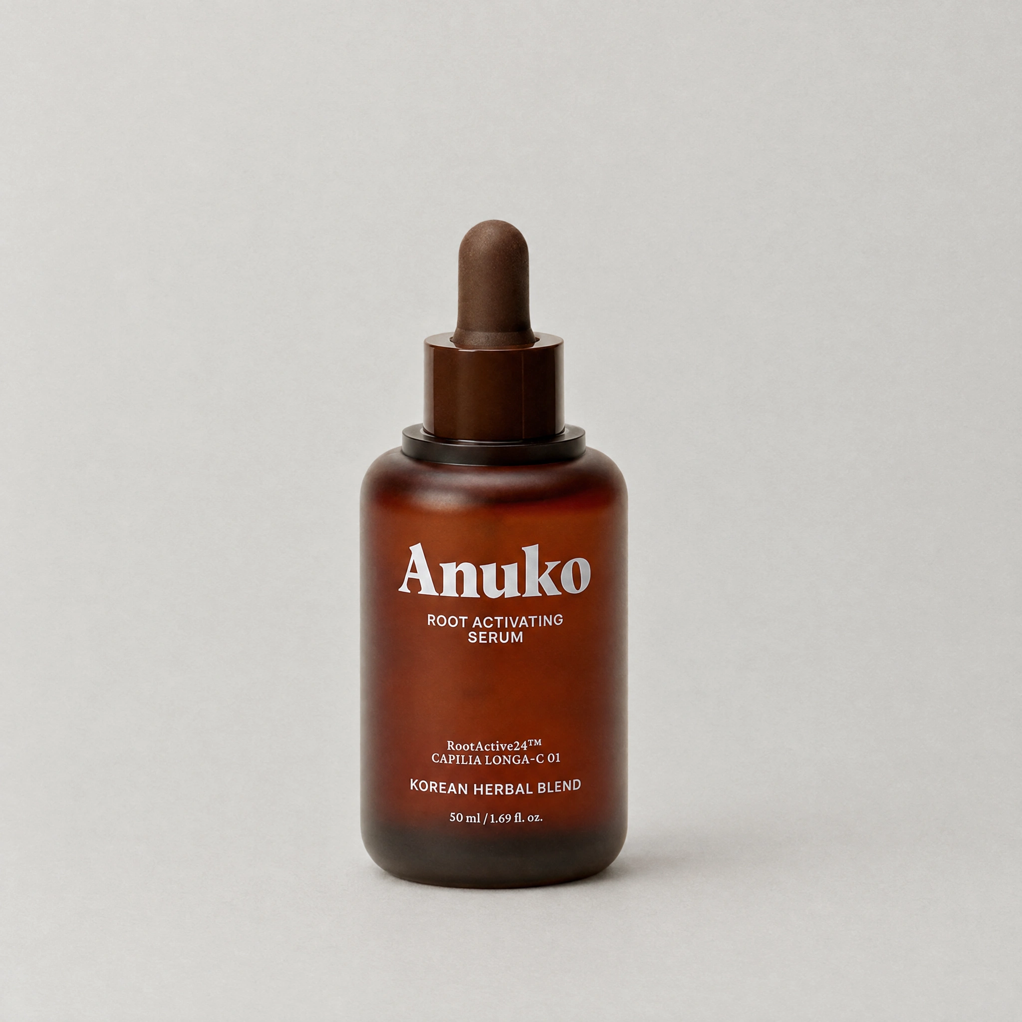 Anuko Root Activating Serum amber dropper bottle with serum droplets