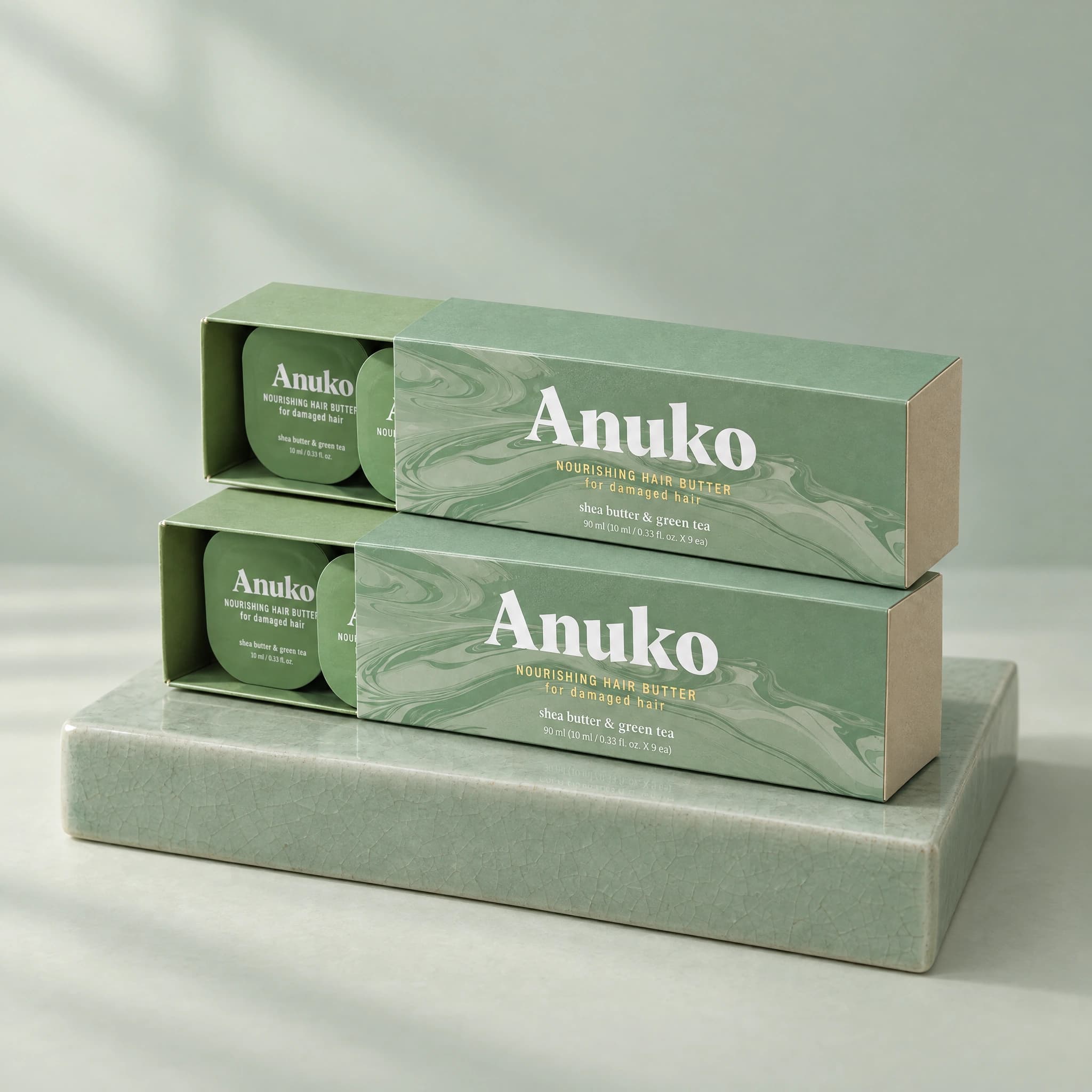 Two Anuko Travel Hair Butter kits